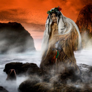 An atua or god stands in a misty landscape with a red sky in the background.